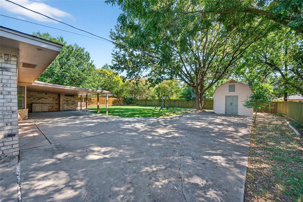 1610 Idlewood Drive Sherman, TX 75092 - Photo 31 of 31 a view of a house with a yard and garage