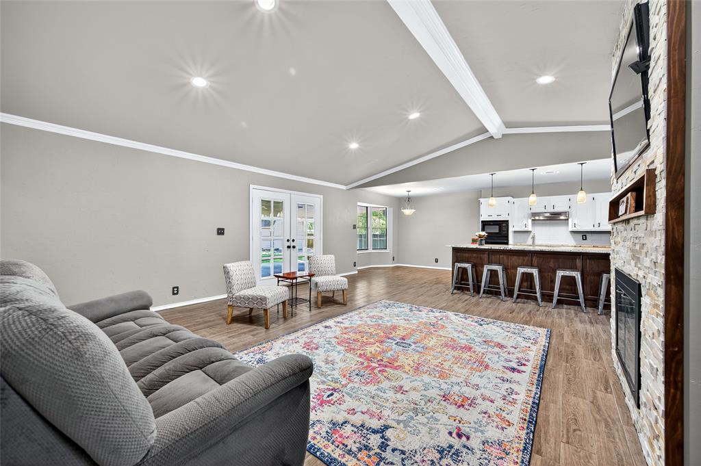 1610 Idlewood Drive Sherman, TX 75092 - Photo 9 of 31 a living room with furniture and a table