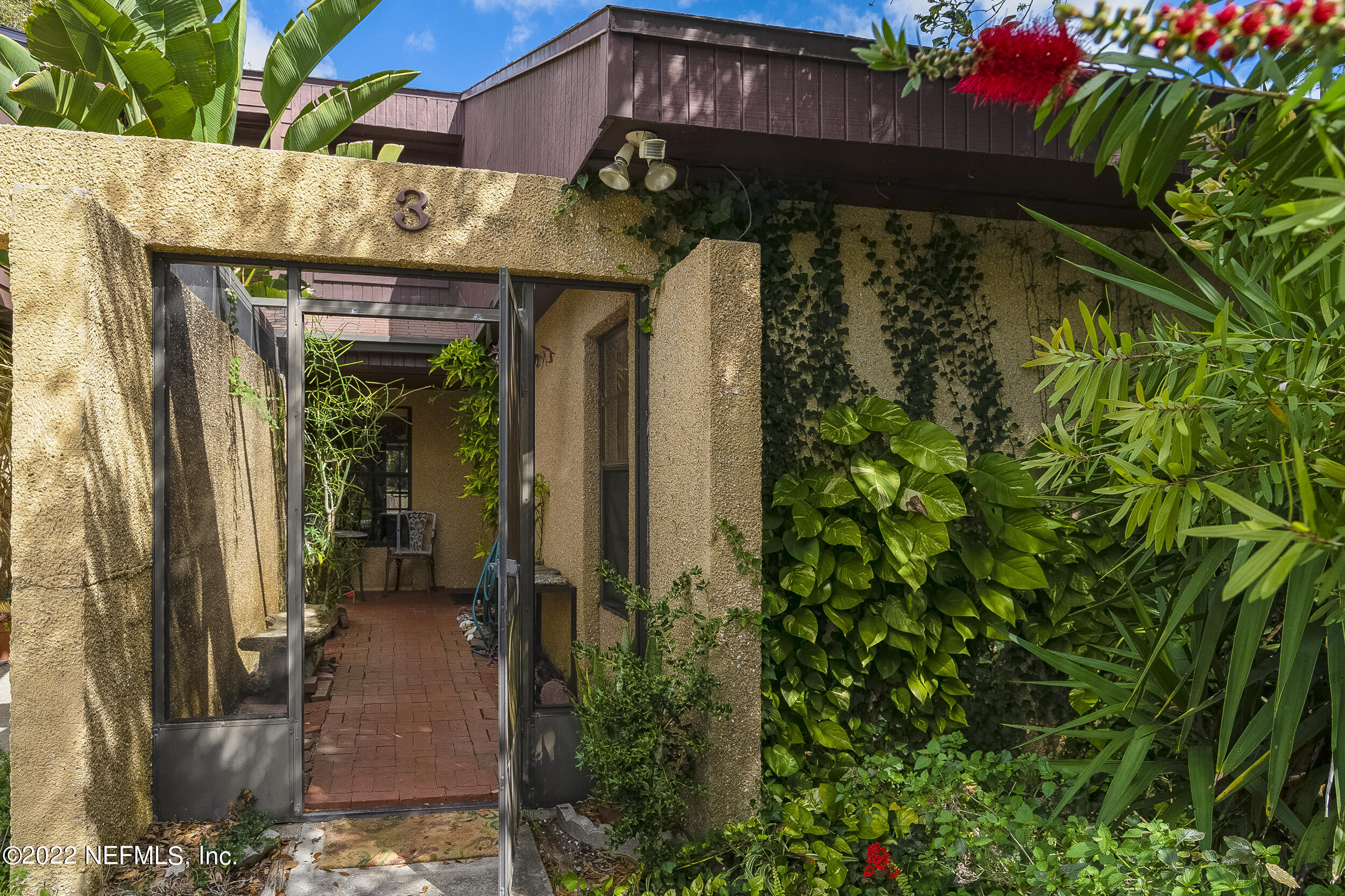 3403 Sanddollar Court St. Augustine, FL 32084 - Photo 14 of 47 a view of a house with potted plants