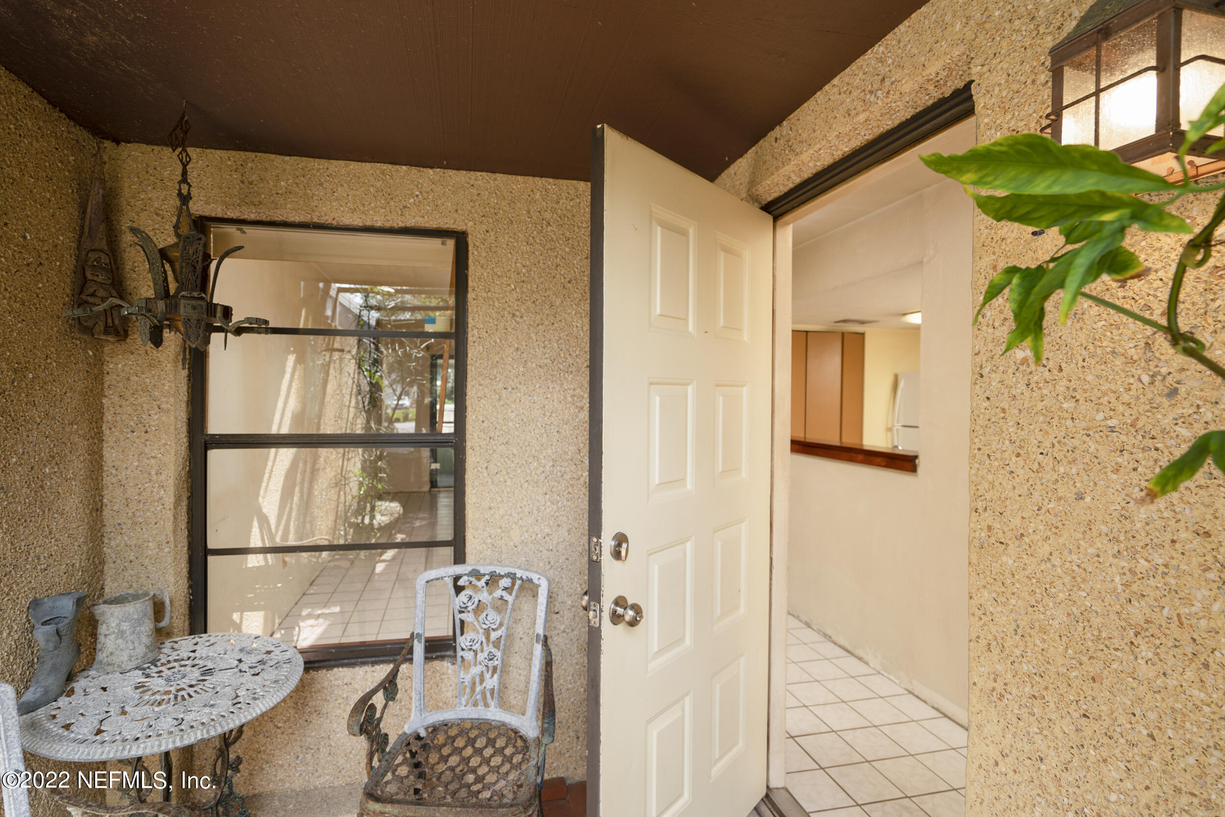 3403 Sanddollar Court St. Augustine, FL 32084 - Photo 17 of 47 a bathroom with a granite countertop sink and a mirror