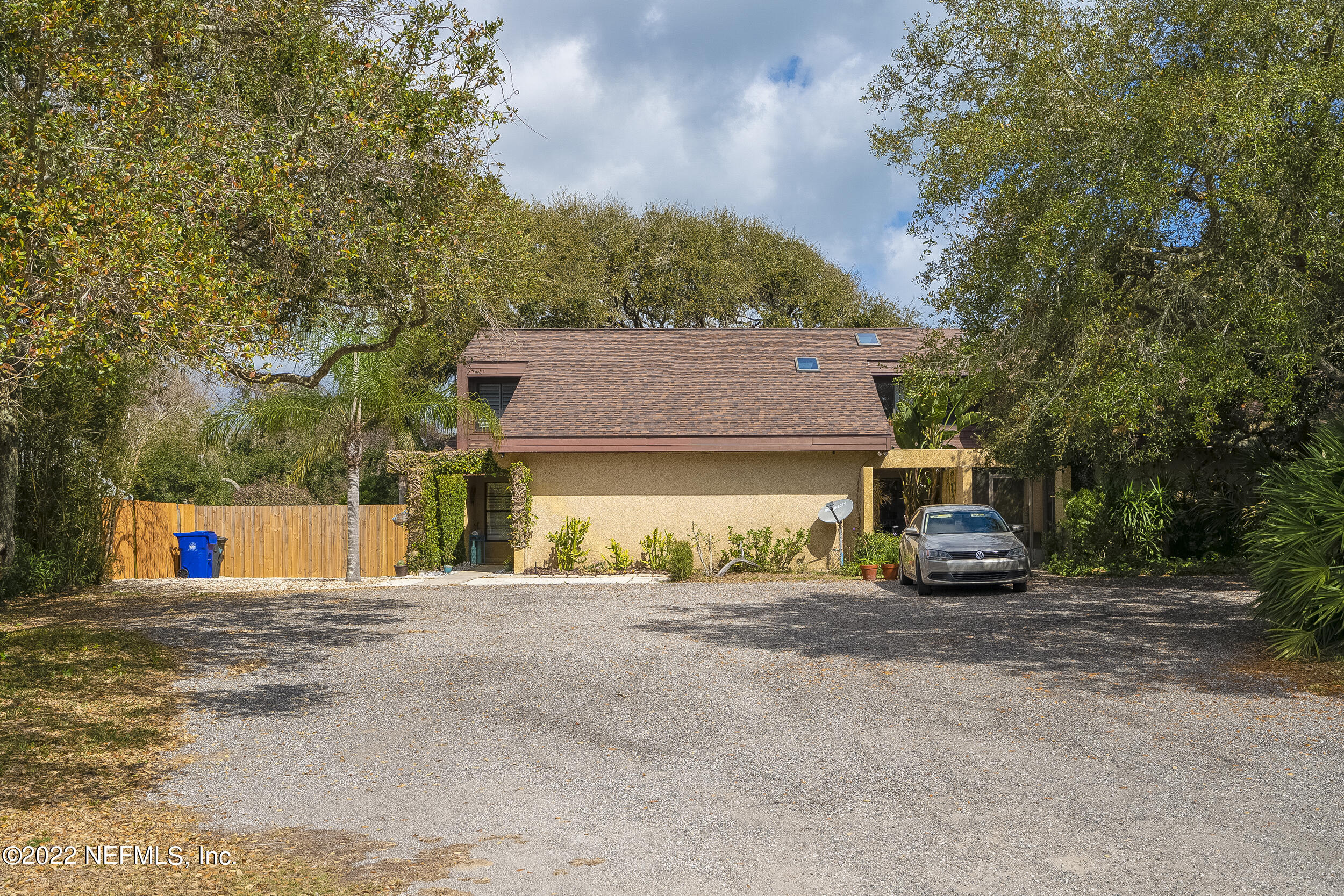 3403 Sanddollar Court St. Augustine, FL 32084 - Photo 2 of 47 a front view of a house with a yard and garage