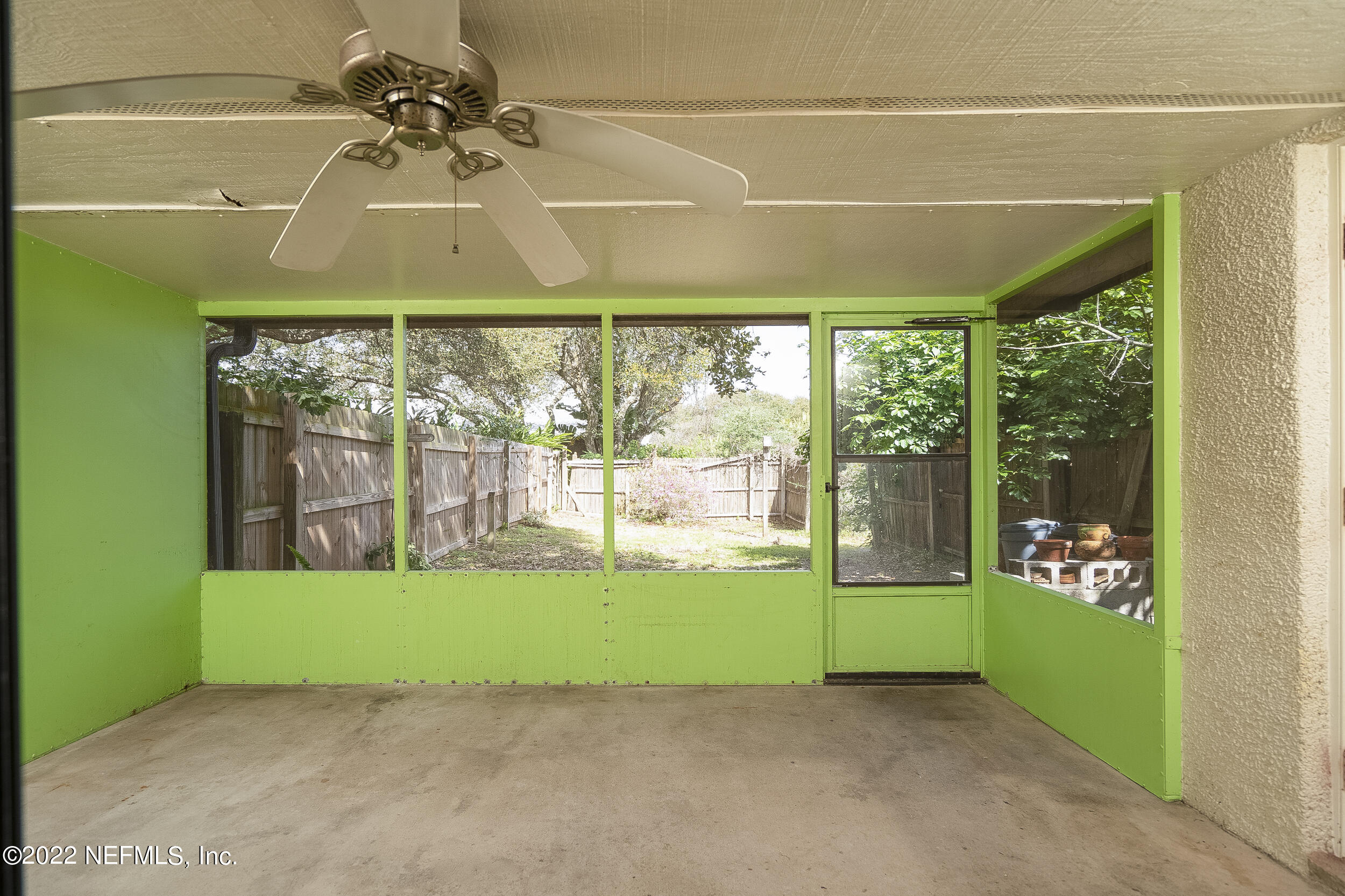 3403 Sanddollar Court St. Augustine, FL 32084 - Photo 24 of 47 a view of a porch with a garden