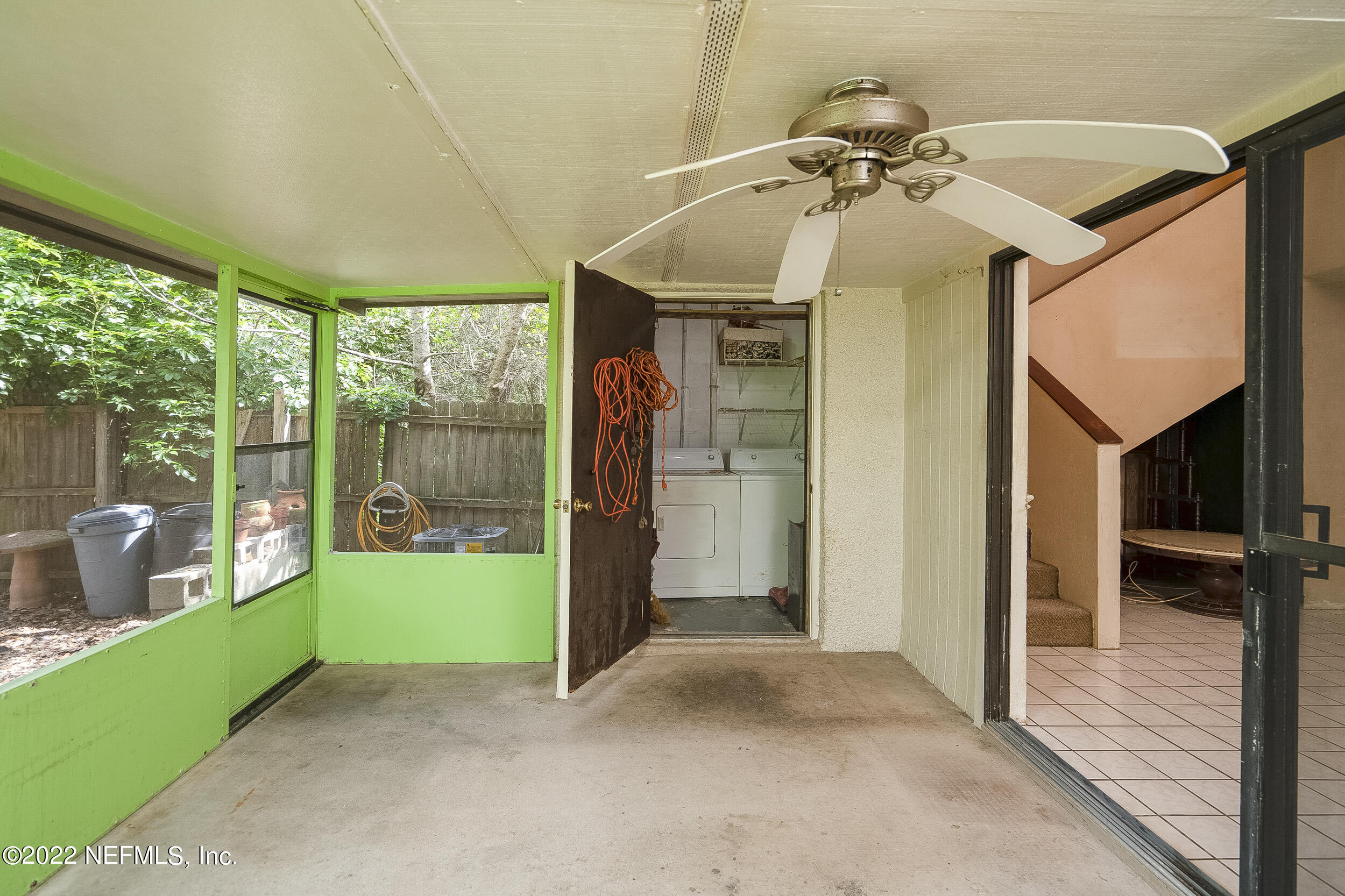 3403 Sanddollar Court St. Augustine, FL 32084 - Photo 28 of 47 a view of a livingroom with furniture and floor to ceiling window