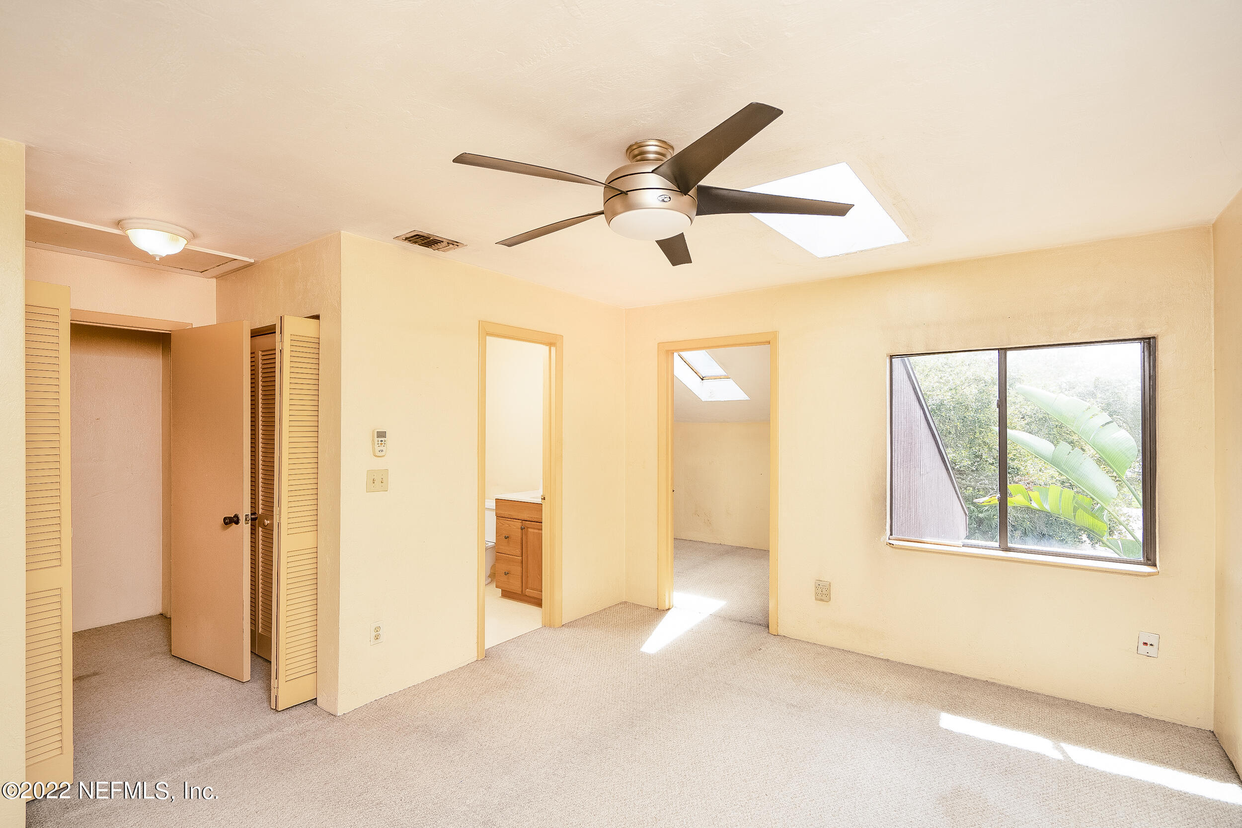 3403 Sanddollar Court St. Augustine, FL 32084 - Photo 5 of 47 a view of an empty room with a window