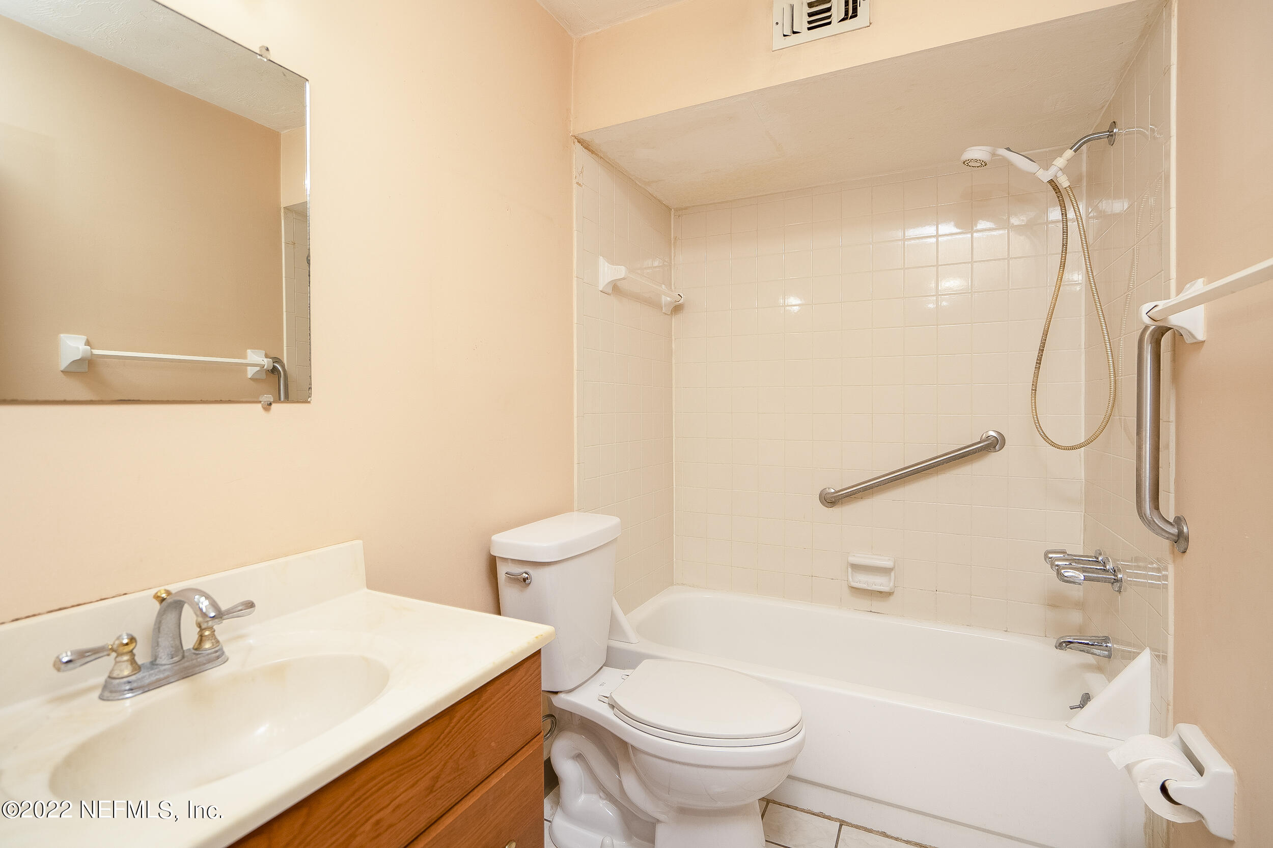 3403 Sanddollar Court St. Augustine, FL 32084 - Photo 6 of 47 a bathroom with a sink a toilet and shower