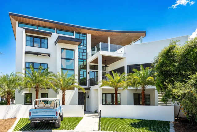 a front view of house with yard outdoor seating and barbeque oven