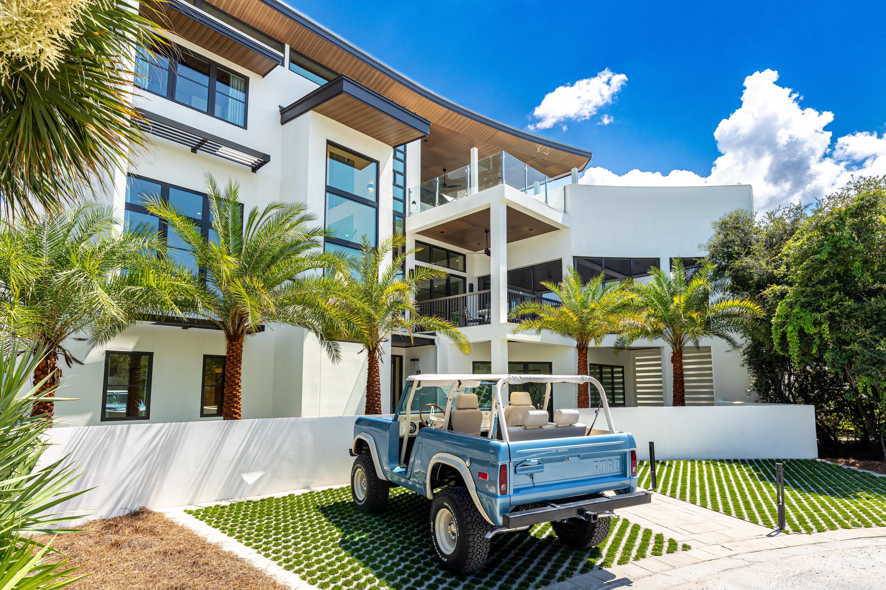 33 Camp Creek Point Dr Inlet Beach Inlet Beach, FL 32461 - Photo 3 of 110 a front view of house with yard outdoor seating and barbeque oven