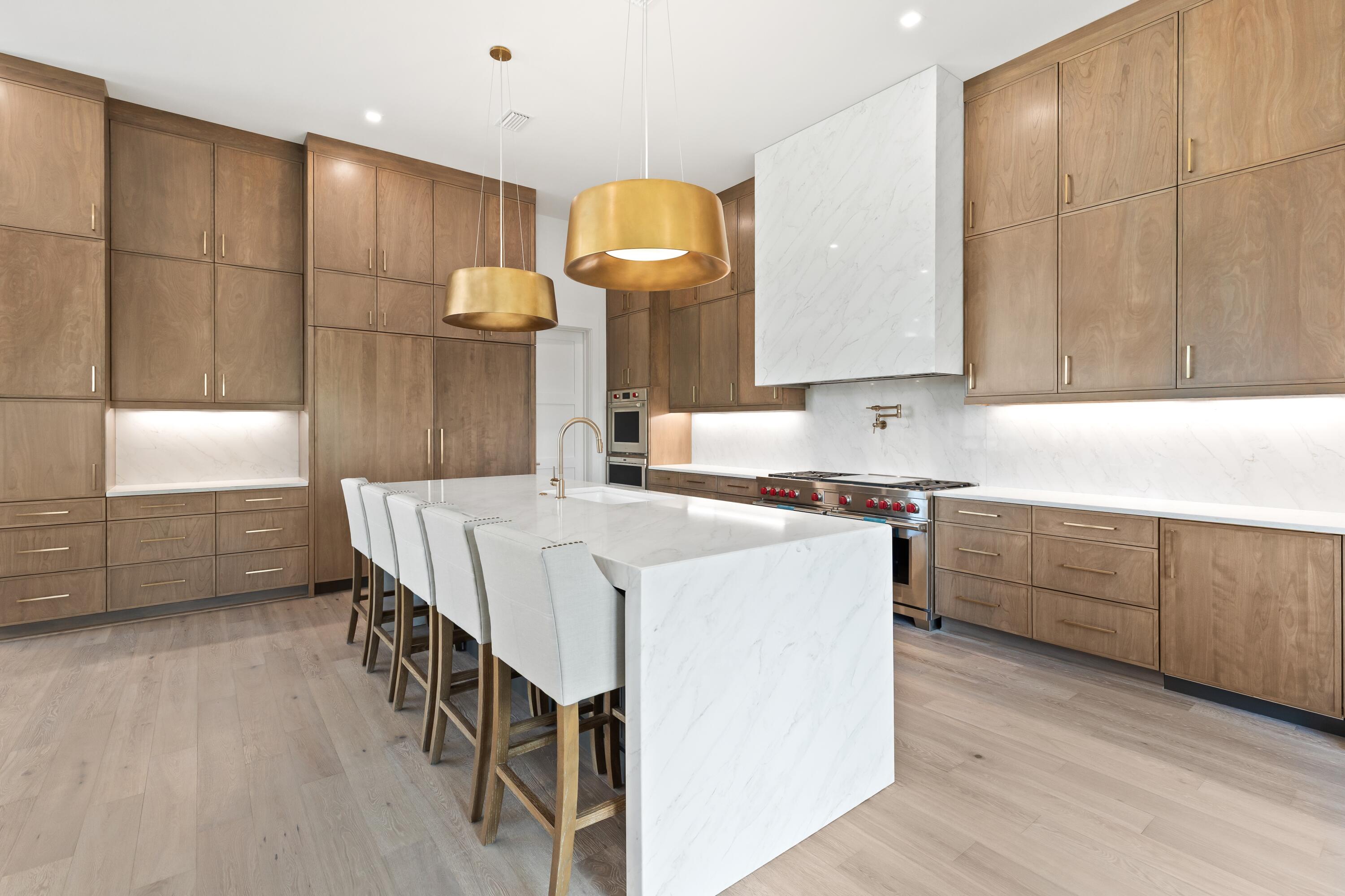 33 Camp Creek Point Dr Inlet Beach Inlet Beach, FL 32461 - Photo 32 of 110 a kitchen that has a lot of cabinets in it and wooden floor