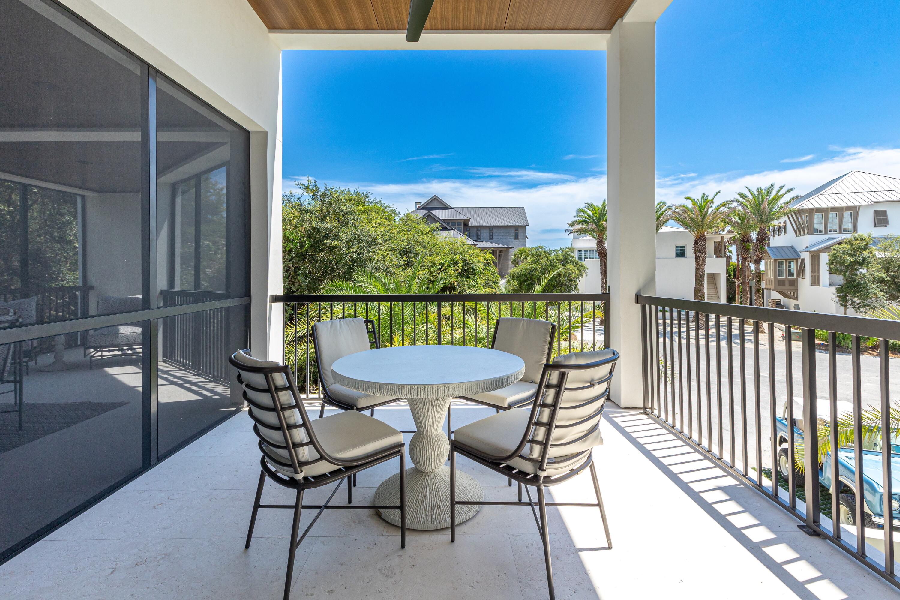 33 Camp Creek Point Dr Inlet Beach Inlet Beach, FL 32461 - Photo 38 of 110 a view of a chair and table in the balcony