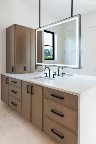 a large white bed in a white room