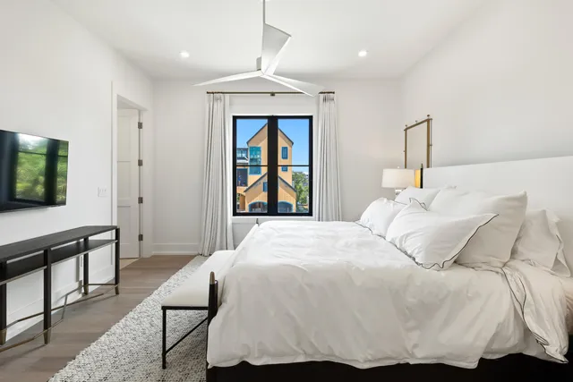 a front view of residential houses with yard