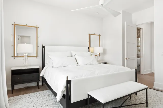 a white building with a clock on the top