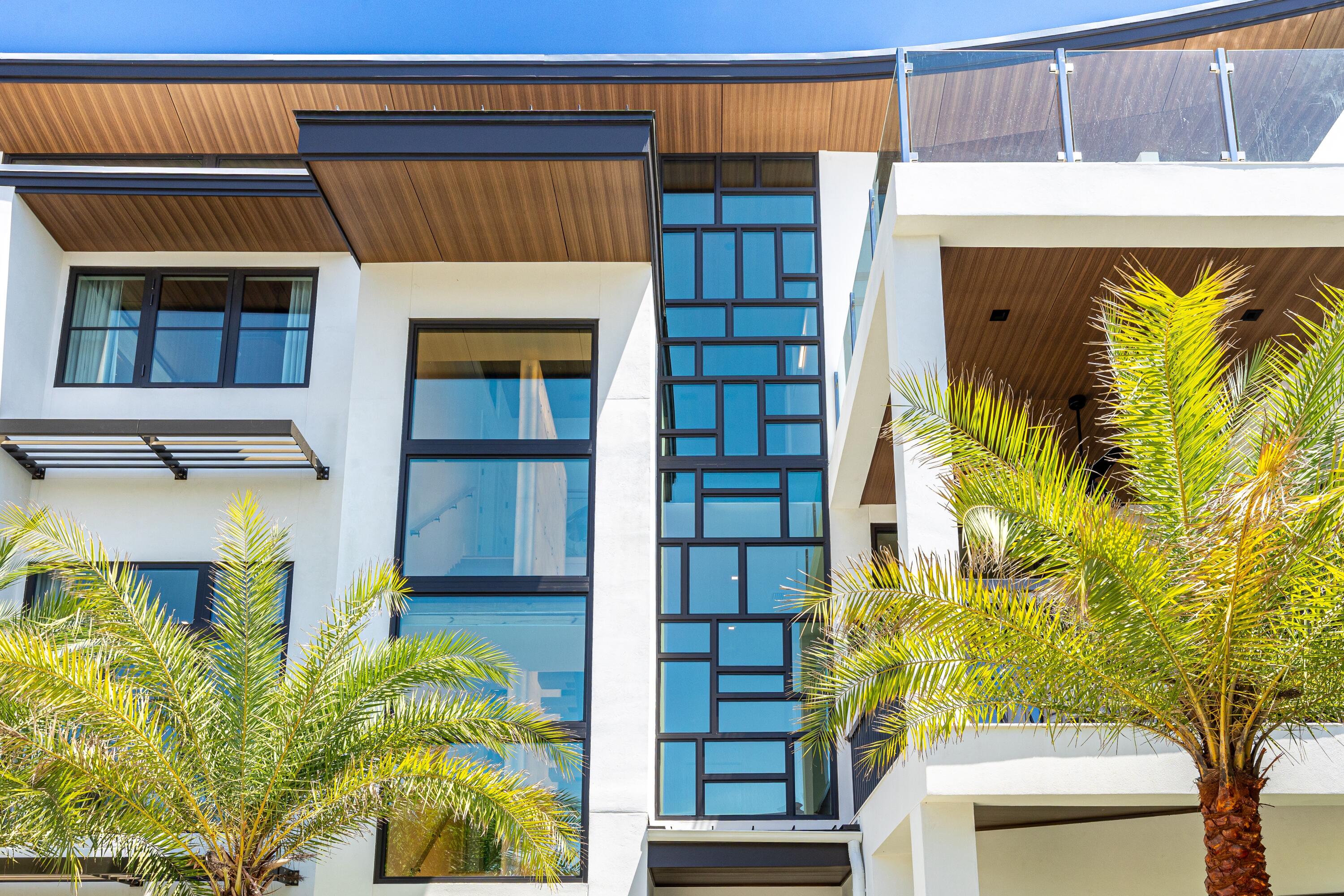 33 Camp Creek Point Dr Inlet Beach Inlet Beach, FL 32461 - Photo 5 of 110 a front view of a house with a garden