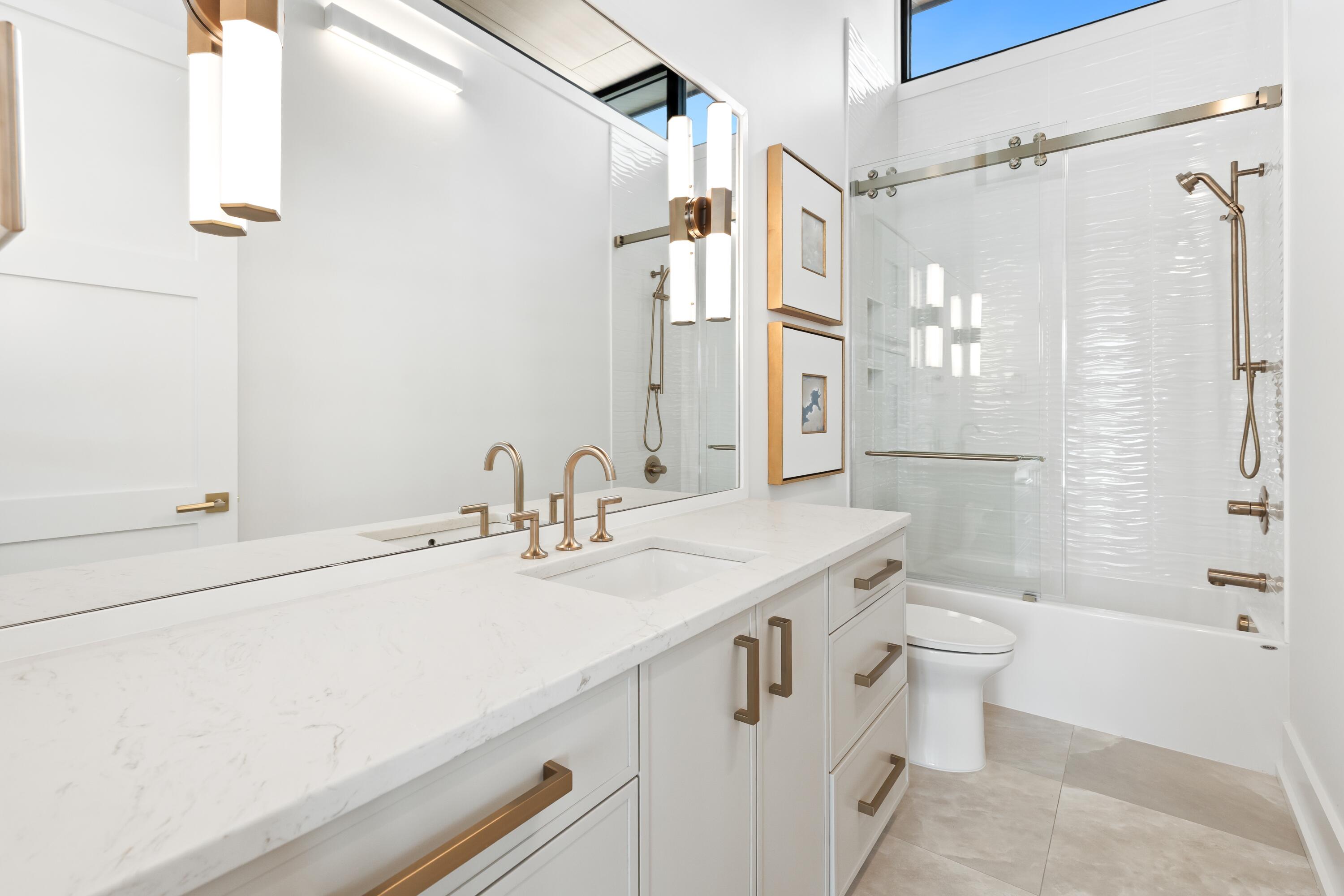 33 Camp Creek Point Dr Inlet Beach Inlet Beach, FL 32461 - Photo 56 of 110 a bathroom with a sink a toilet a mirror and shower