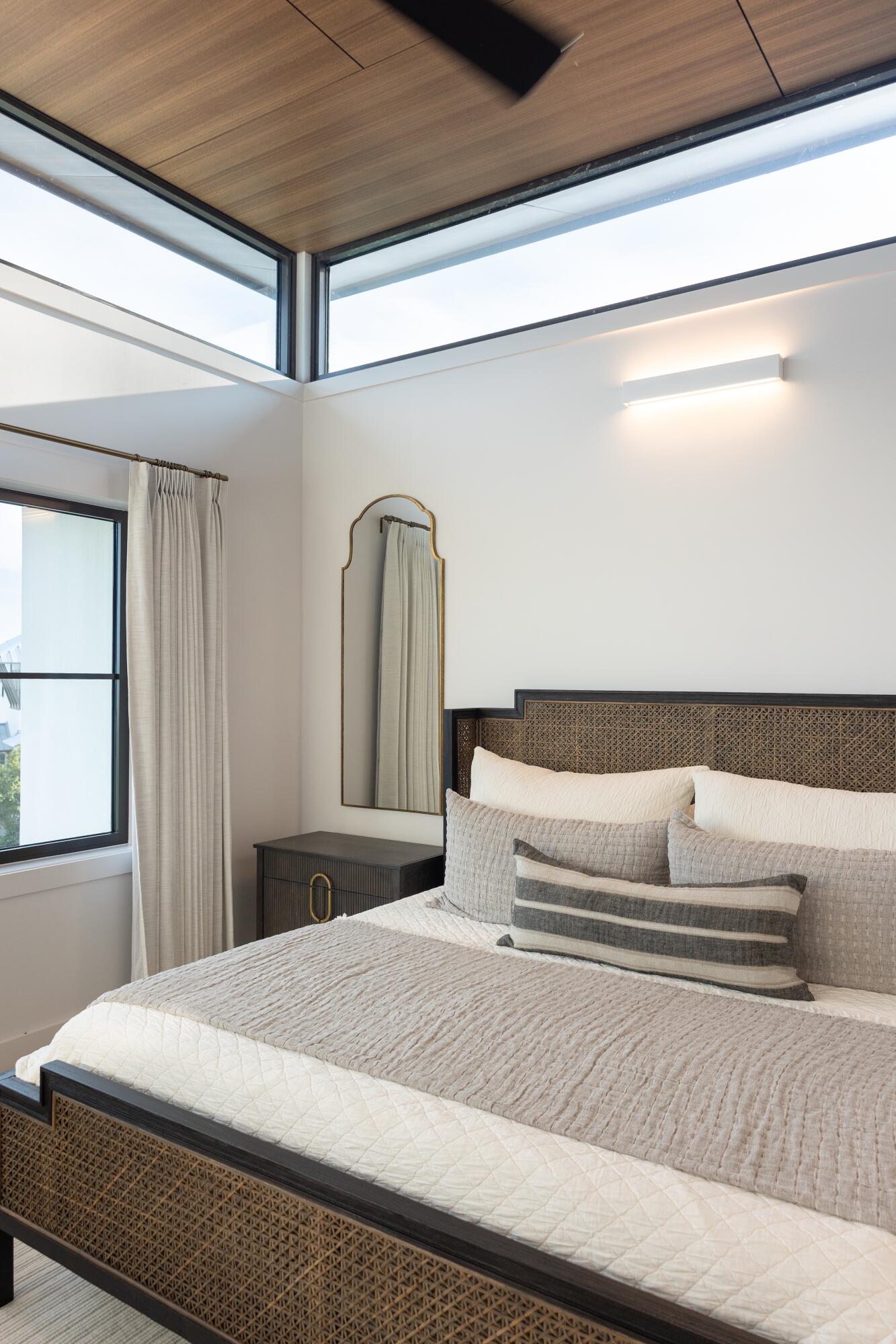 33 Camp Creek Point Dr Inlet Beach Inlet Beach, FL 32461 - Photo 69 of 110 a bedroom with a white bed and wooden floor