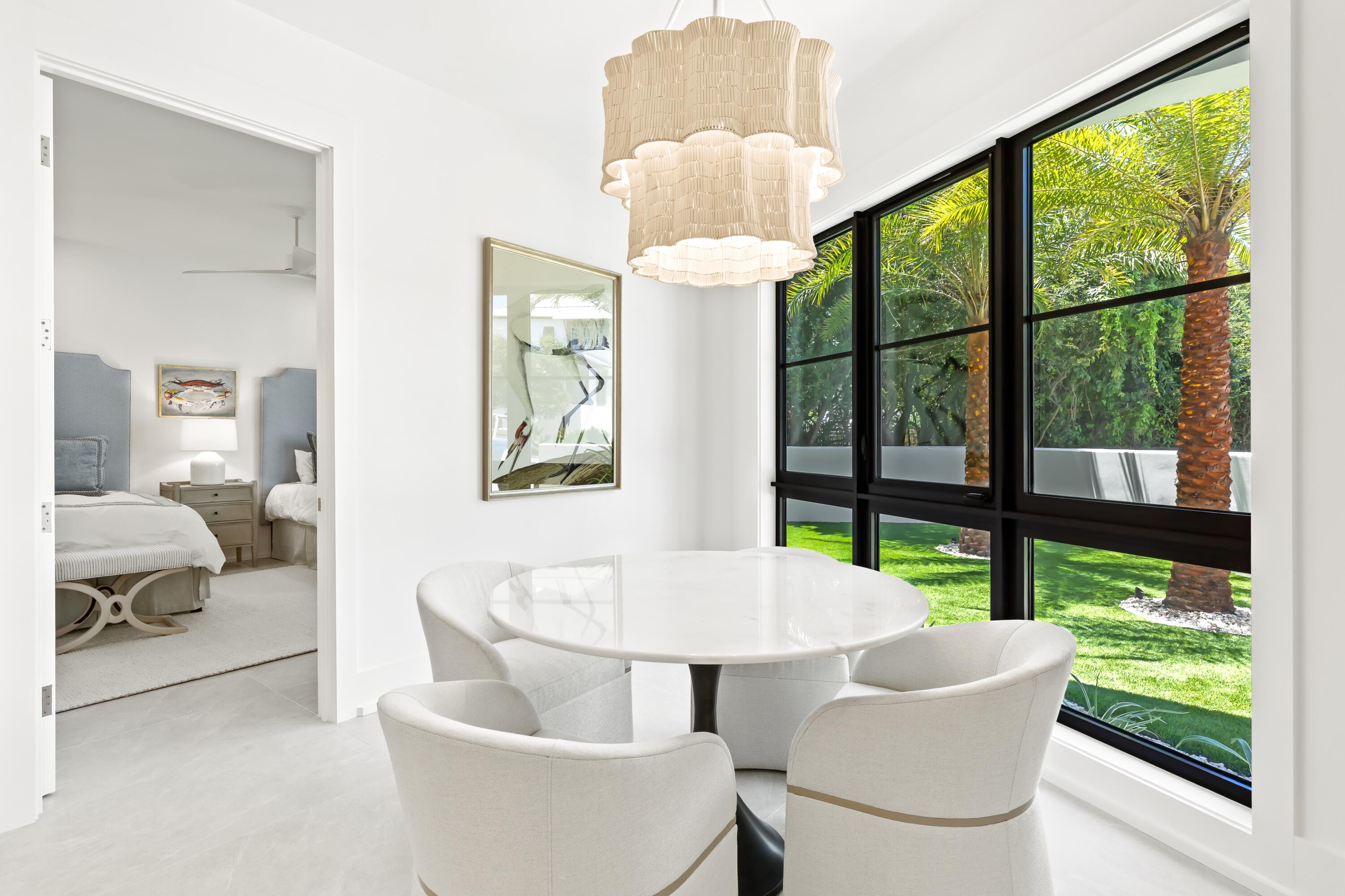 33 Camp Creek Point Dr Inlet Beach Inlet Beach, FL 32461 - Photo 79 of 110 a view of a dining room with furniture a chandelier and large windows