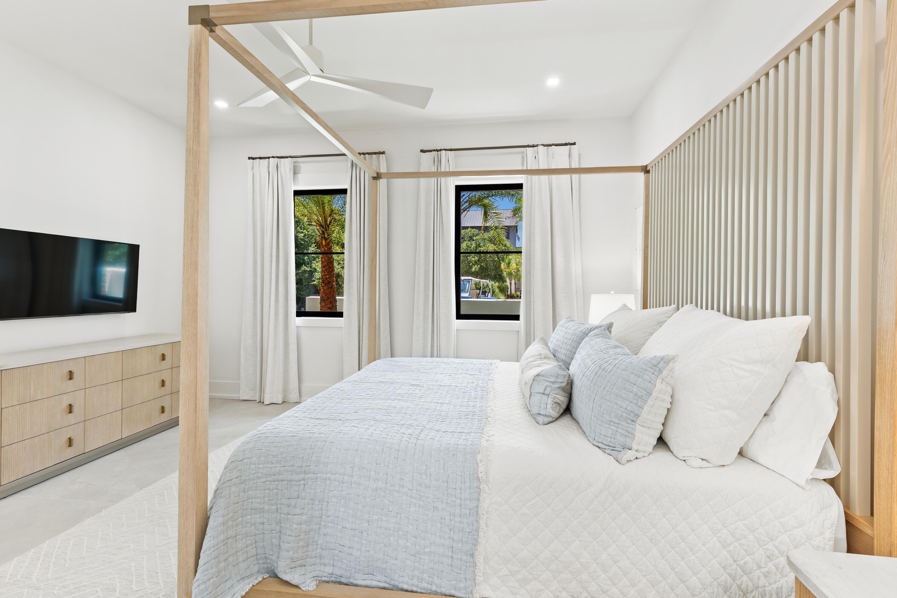 33 Camp Creek Point Dr Inlet Beach Inlet Beach, FL 32461 - Photo 91 of 110 a large white bed in a white room