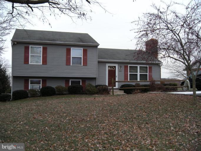 4297 Bark Hill Road Union Bridge, MD 21791 - Photo 12 of 16 a front view of house with yard and trees