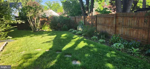 a backyard of a fence