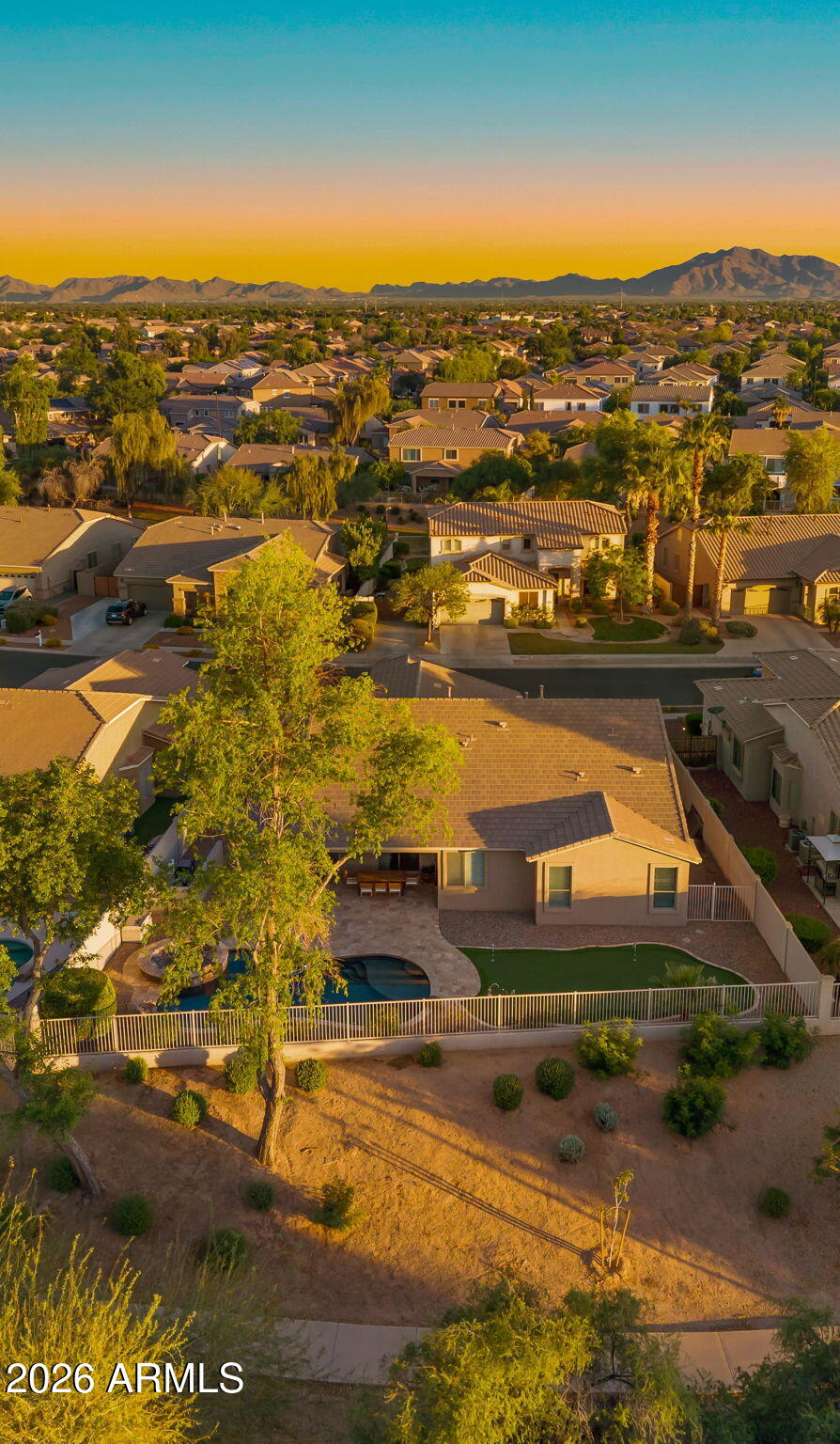 3344 East Hopkins Road Gilbert, AZ 85295 - Photo 29 of 32 an aerial view of residential houses with outdoor space