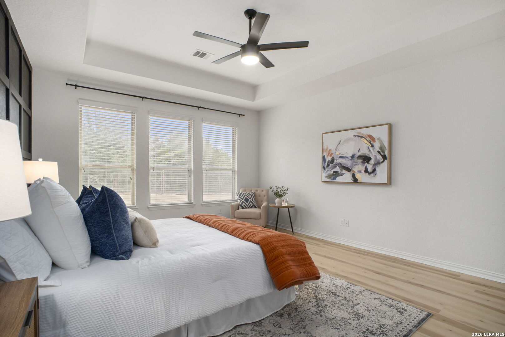 32134 Mirasol Bend Bulverde, TX 78163 - Photo 23 of 44 a bedroom with a bed and a large window