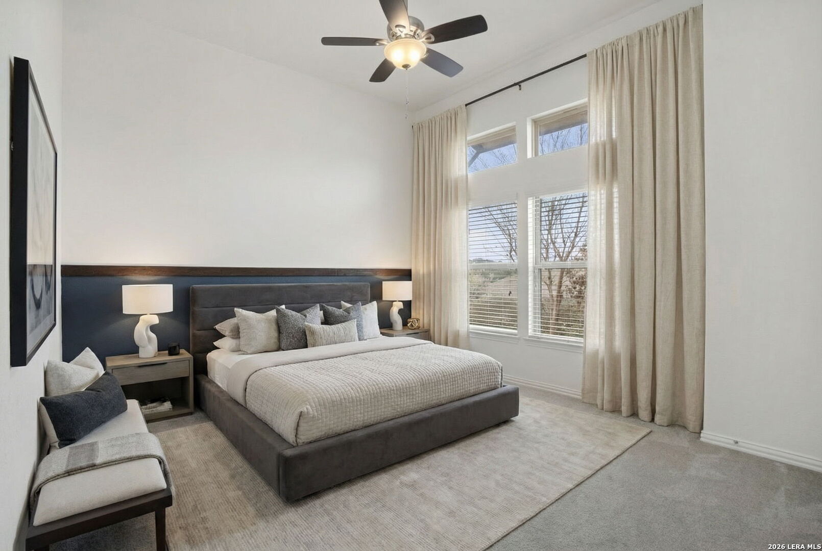 32134 Mirasol Bend Bulverde, TX 78163 - Photo 29 of 44 a bedroom with a bed and a large window