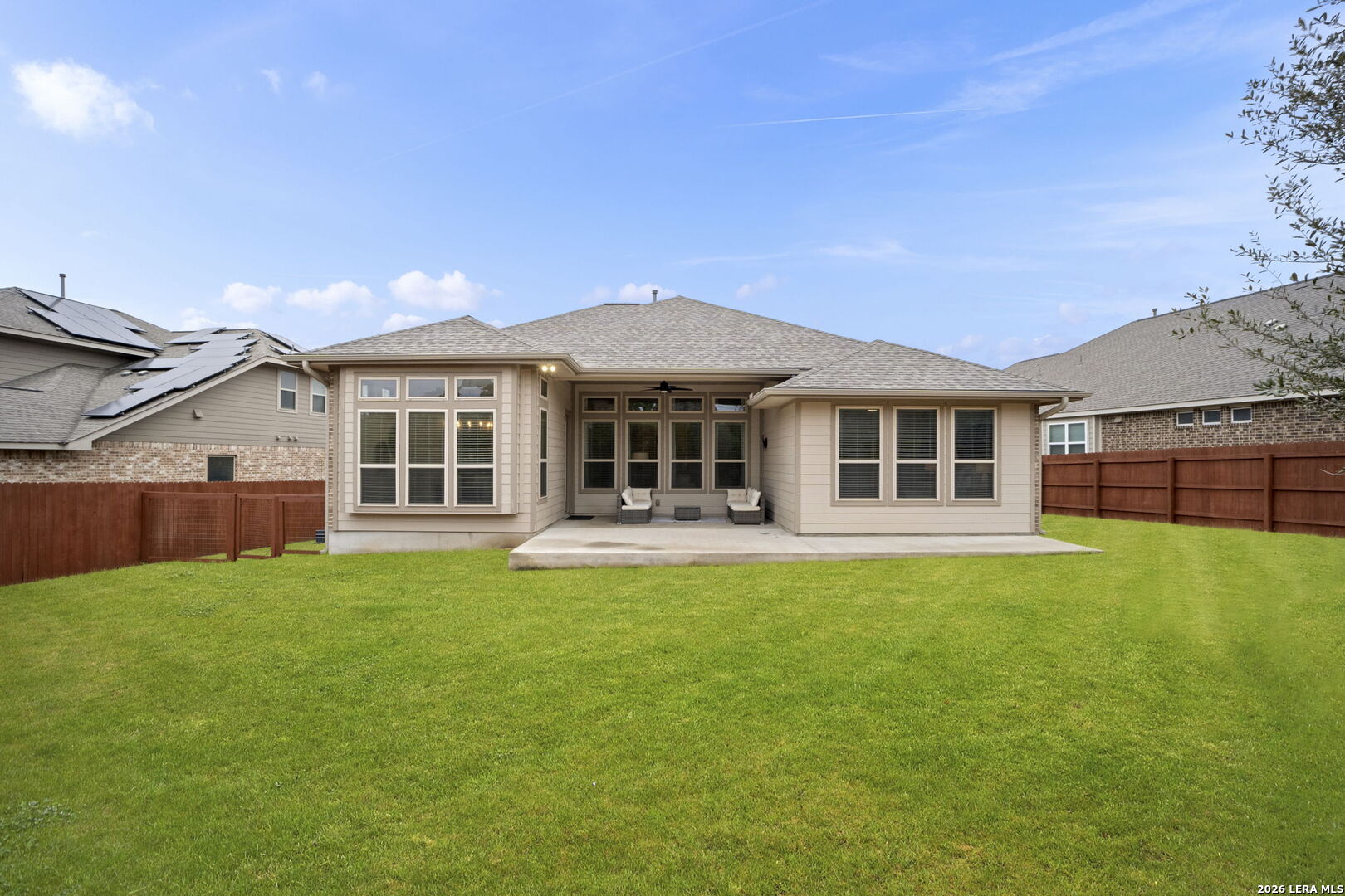 32134 Mirasol Bend Bulverde, TX 78163 - Photo 37 of 44 a view of a house with a backyard