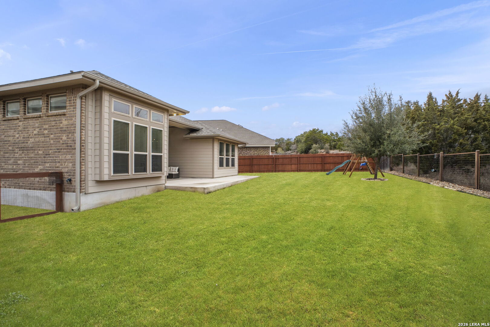 32134 Mirasol Bend Bulverde, TX 78163 - Photo 38 of 44 a front view of a house with garden