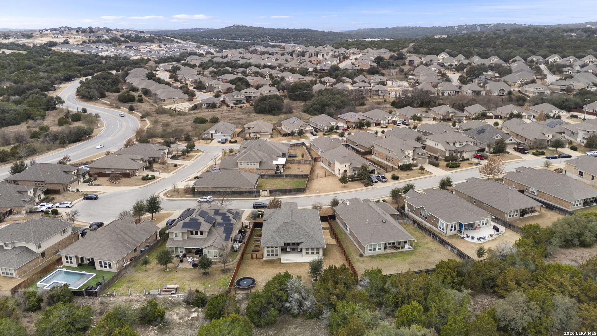 32134 Mirasol Bend Bulverde, TX 78163 - Photo 40 of 44 an aerial view of residential houses with outdoor space