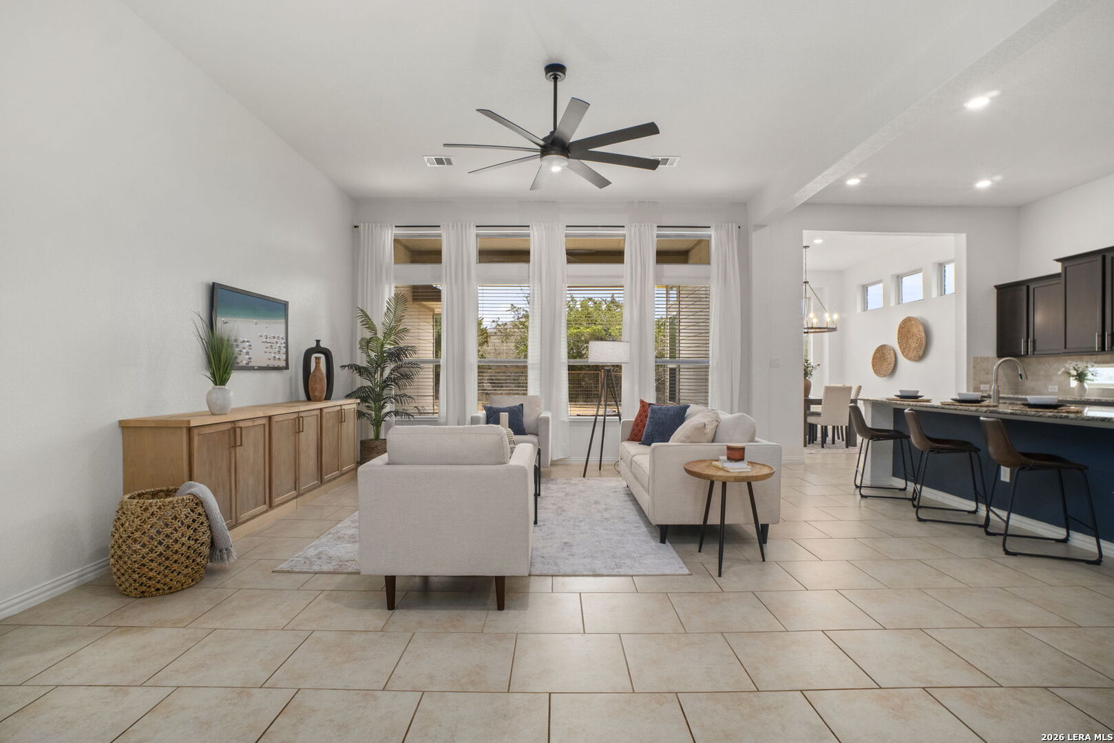 32134 Mirasol Bend Bulverde, TX 78163 - Photo 7 of 44 a living room with furniture and a flat screen tv