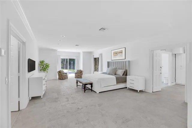 a bed room with furniture and a couch