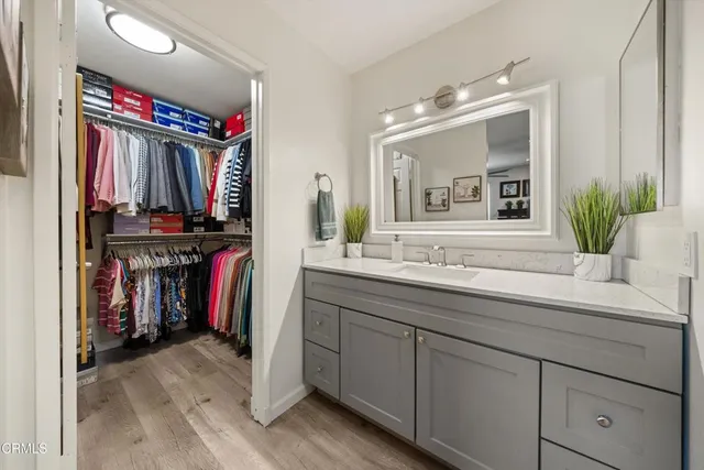 a view of a sink storage and utility room