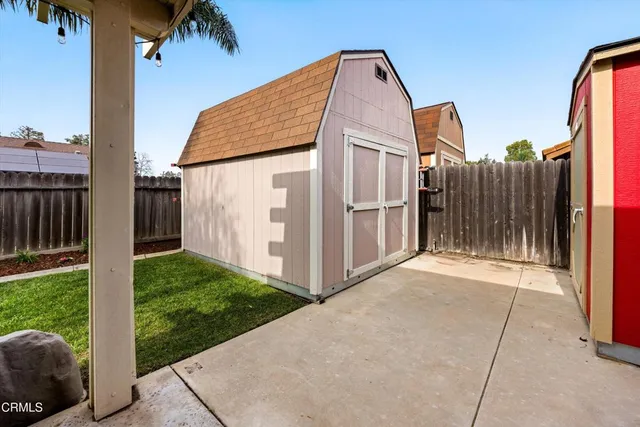 a view of a back yard of the house