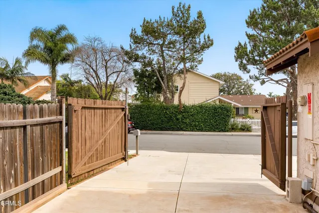 a view of a house with a street