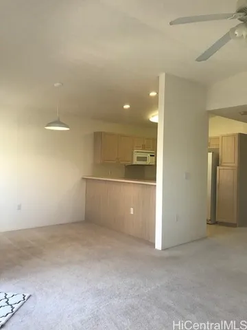 an empty room with a bathroom