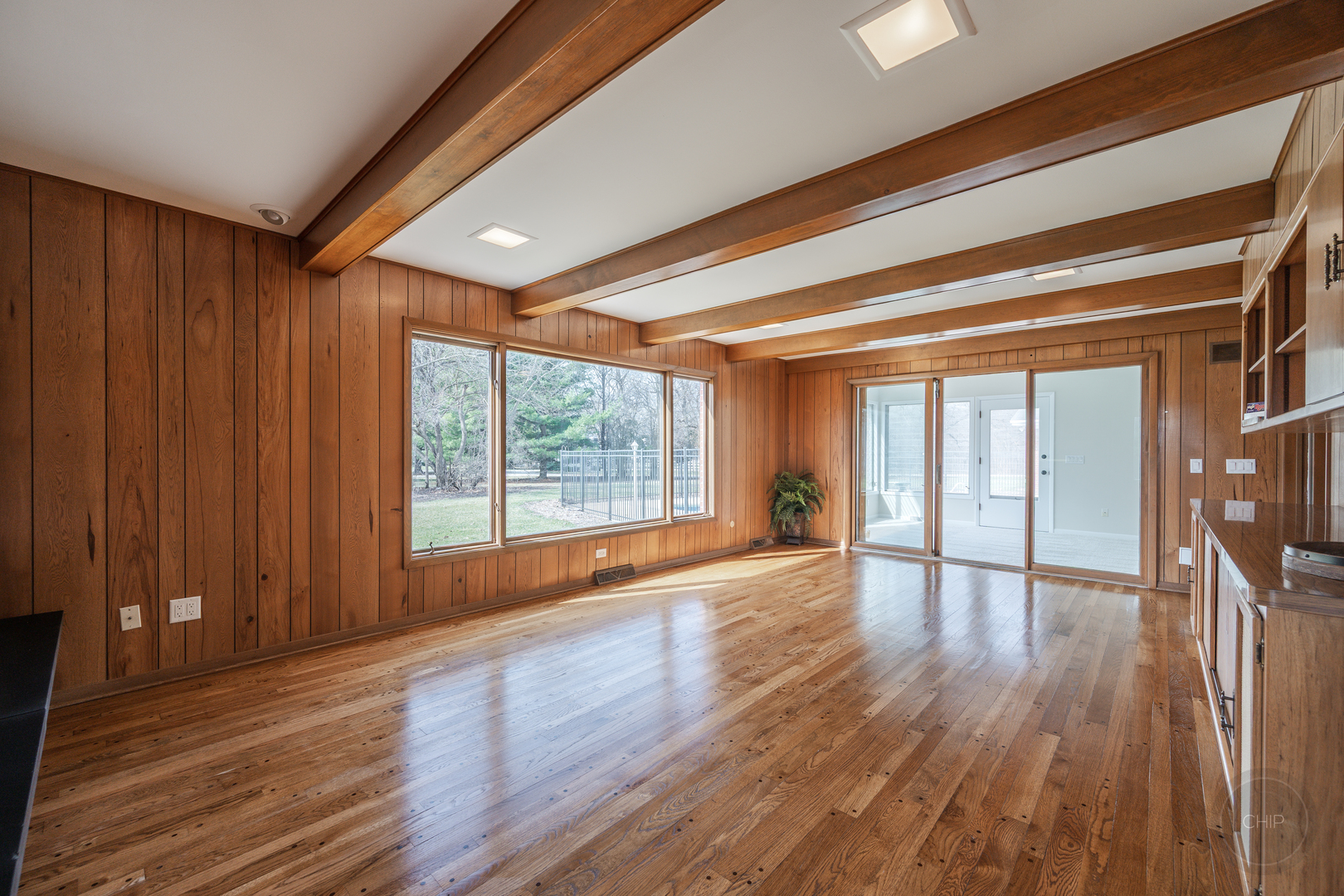 15600 Griswold Springs Road Plano, IL 60545 - Photo 25 of 96 a view of empty room with wooden floor and fan
