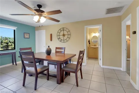 a view of a balcony with chairs