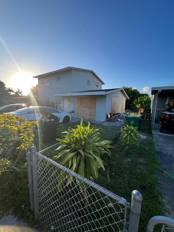 758 Southwest 3rd Place Dania Beach, FL 33004 - Photo 19 of 26 a picture of a table and chairs in patio