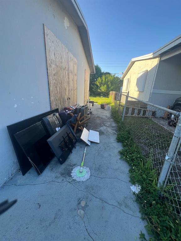 758 Southwest 3rd Place Dania Beach, FL 33004 - Photo 20 of 26 a living room with furniture and a floor to ceiling window