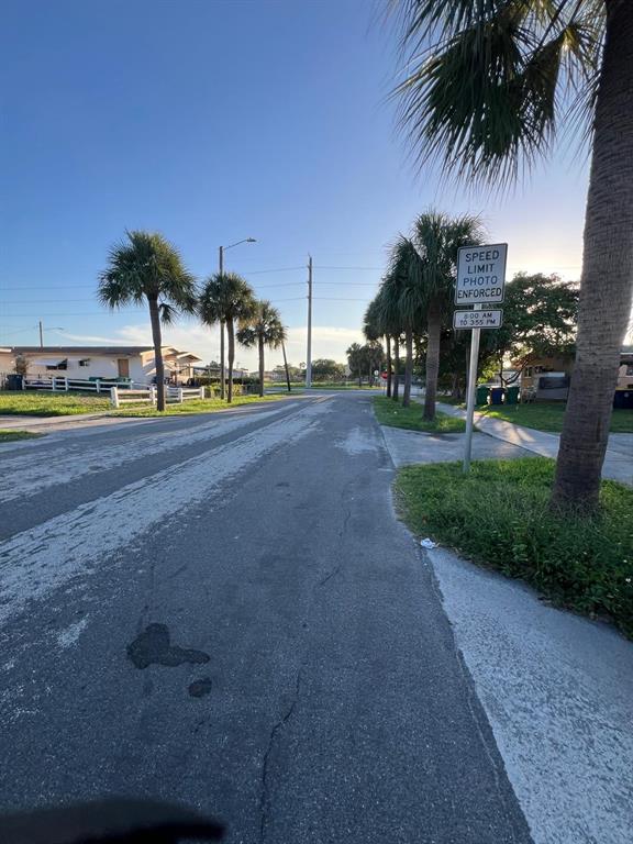 758 Southwest 3rd Place Dania Beach, FL 33004 - Photo 25 of 26 a view of a yard with a slide