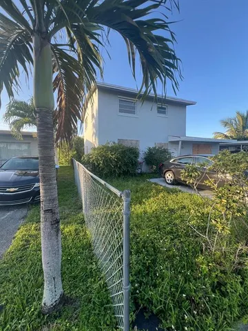 a view of a garden with pathway