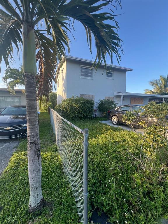 758 Southwest 3rd Place Dania Beach, FL 33004 - Photo 3 of 26 a view of a garden with pathway