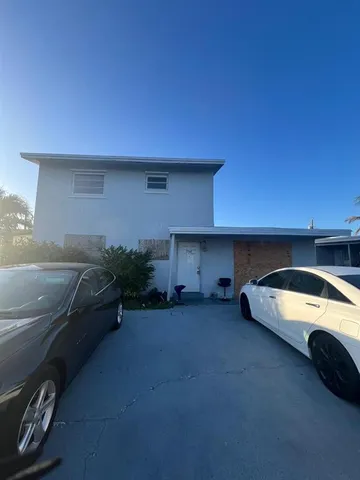 a car parked in front of a building