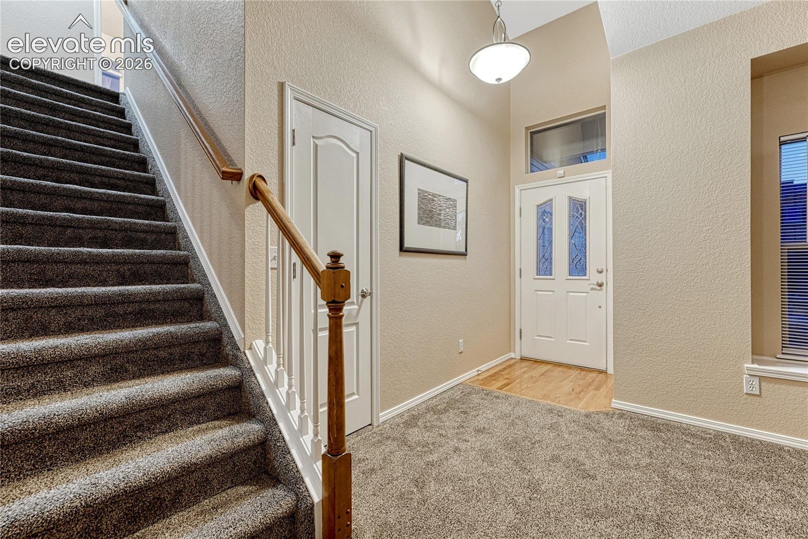 2413 Cinnabar Road Colorado Springs, CO 80921 - Photo 18 of 50 Coat closet by the front door and plenty of space to come on inside