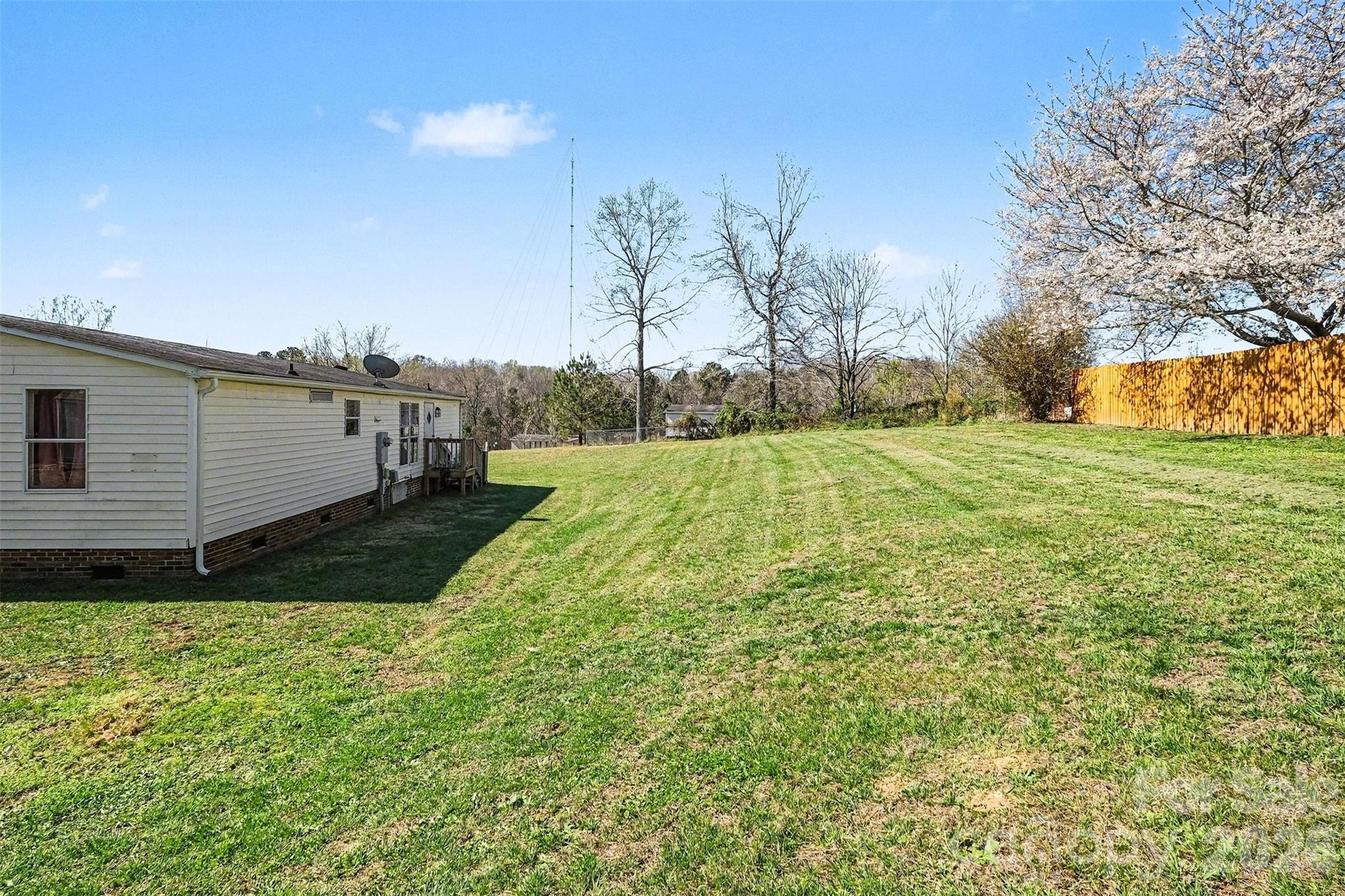4106 Olga Court Dallas, NC 28034 - Photo 26 of 30 a view of a back yard of the house