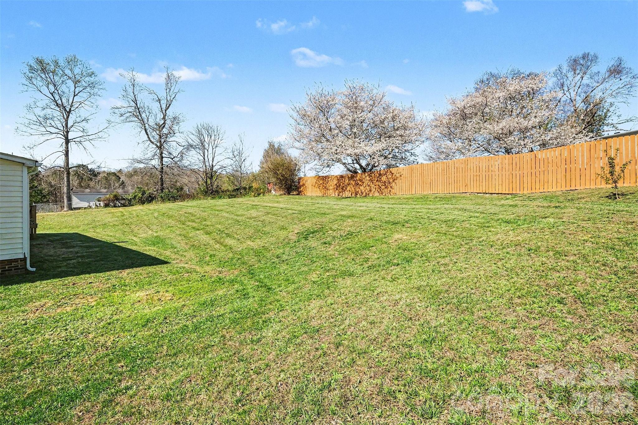 4106 Olga Court Dallas, NC 28034 - Photo 28 of 30 a view of a field with an trees