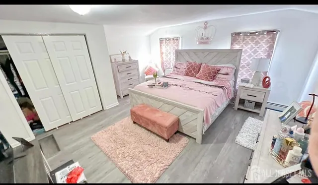 a bed room with a bed and a couch