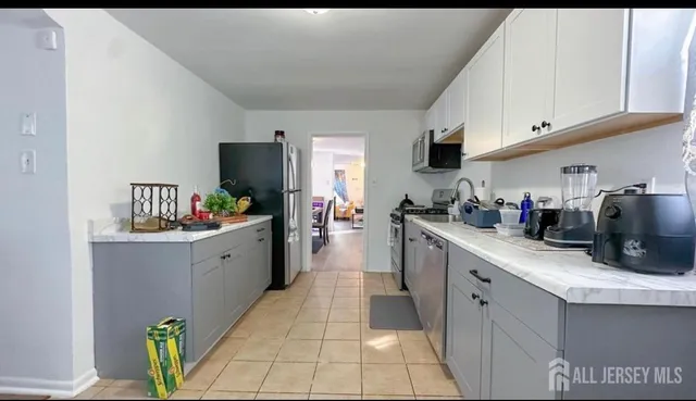 a kitchen with sink cabinets and counter space