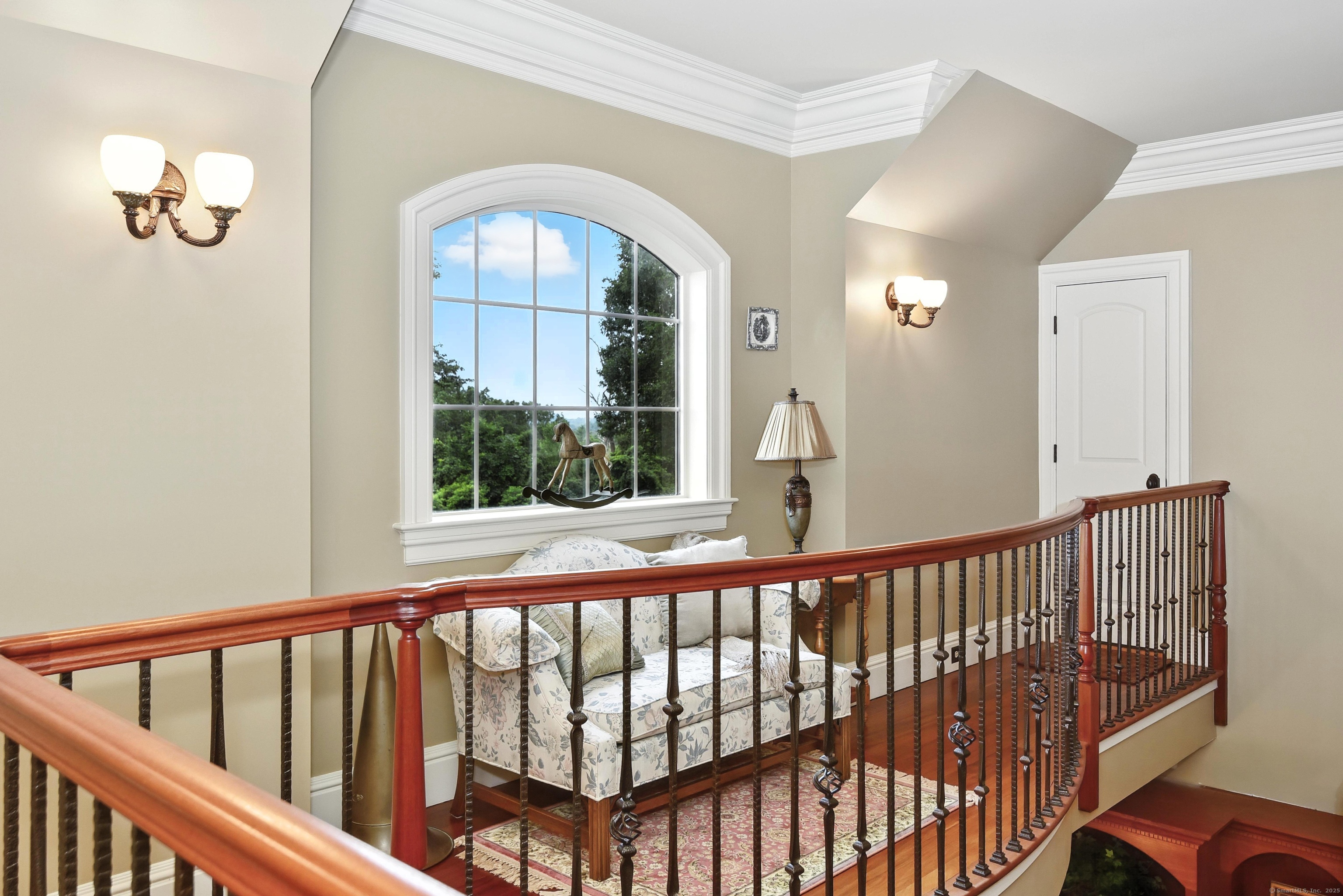 282 Searles Road Pomfret, CT 06259 - Photo 19 of 40 Bowed balcony opens to great room. Oversized window with sitting area provides views into Rhode Island. Access the attic through the loft door.