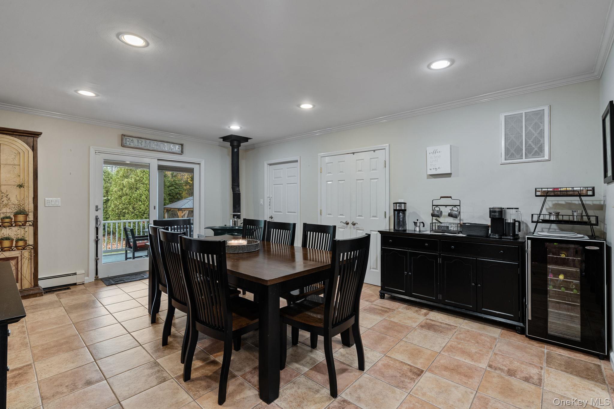 6 Daniel Way Setauket, NY 11733 - Photo 18 of 41 a view of a dining room with furniture